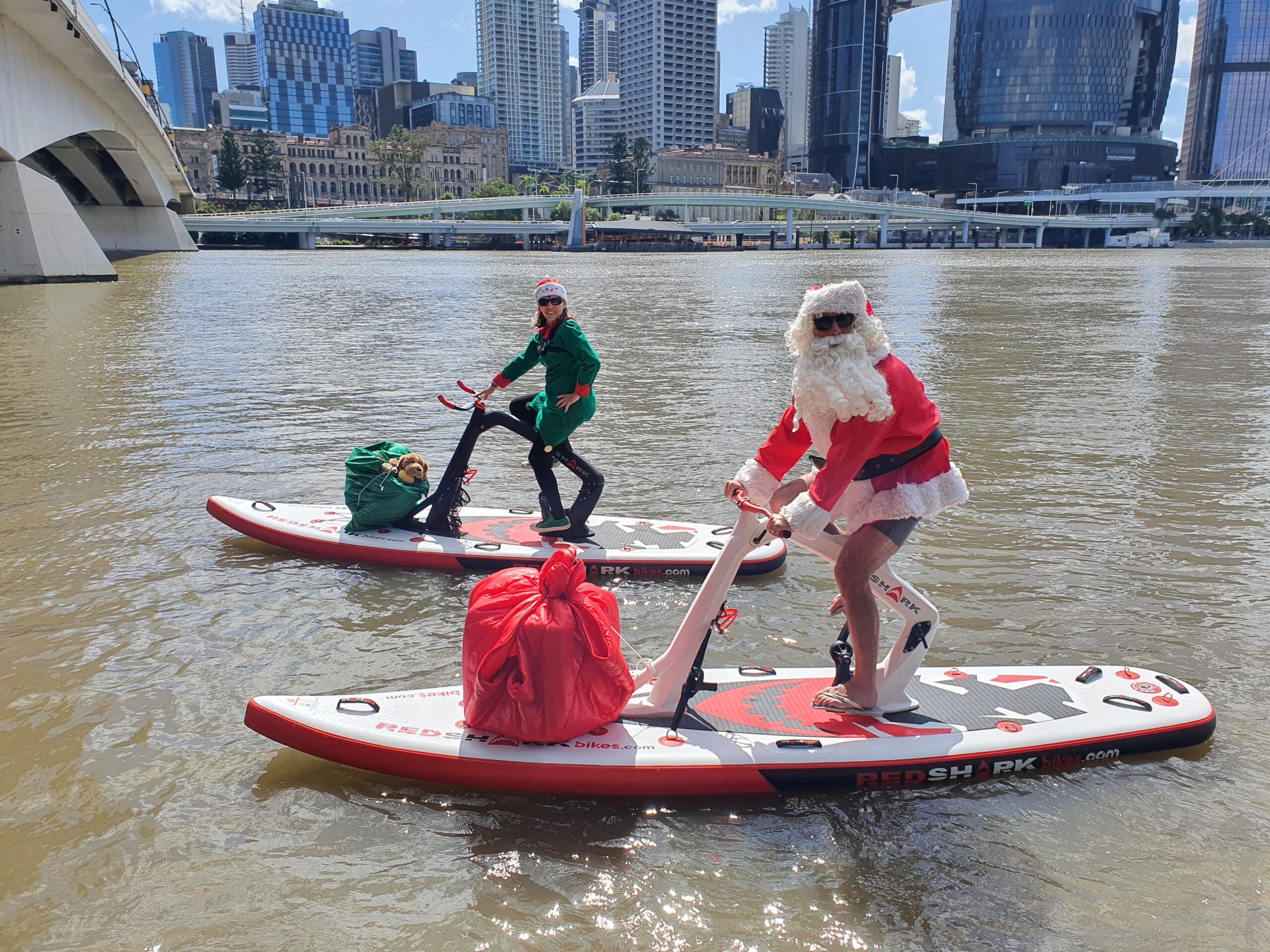 Santa's riding a Red Shark Bike